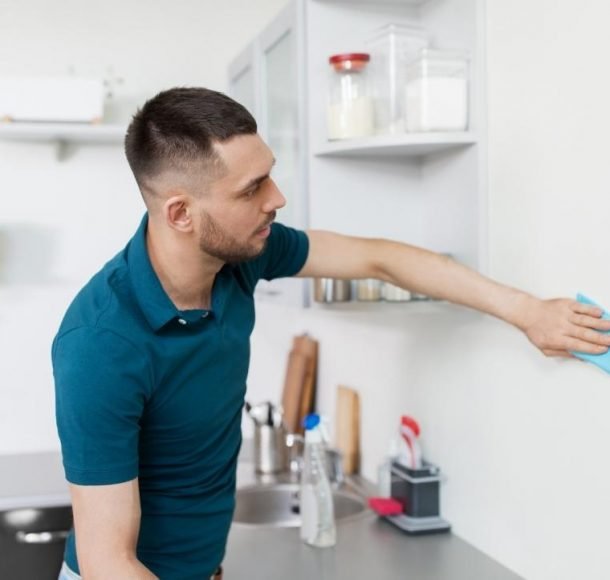 Man Cleaning WallHow to clean the dirty walls of my home - Orchid Cleaning Services