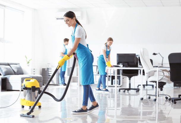 Cleaning team in an office. Tips to disinfect the house and office