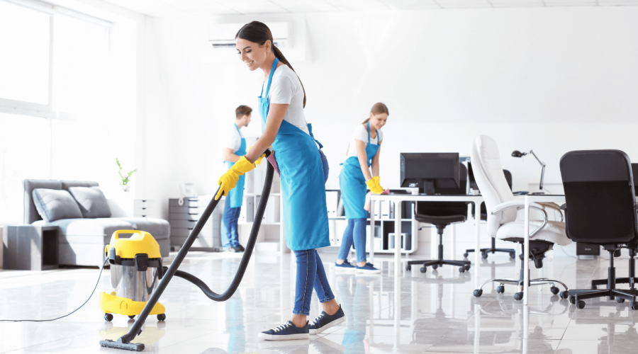 Cleaning team in an office. Tips to disinfect the house and office